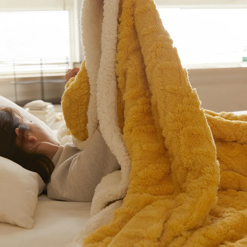 Polyester thermal flannel blanket in tea green colour on a bed, showing modern simplicity design.