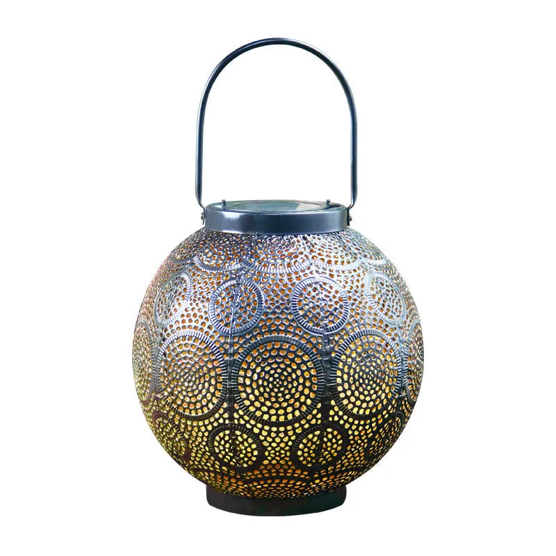 Solar courtyard lamp with decorative iron hollow design and integrated solar panel