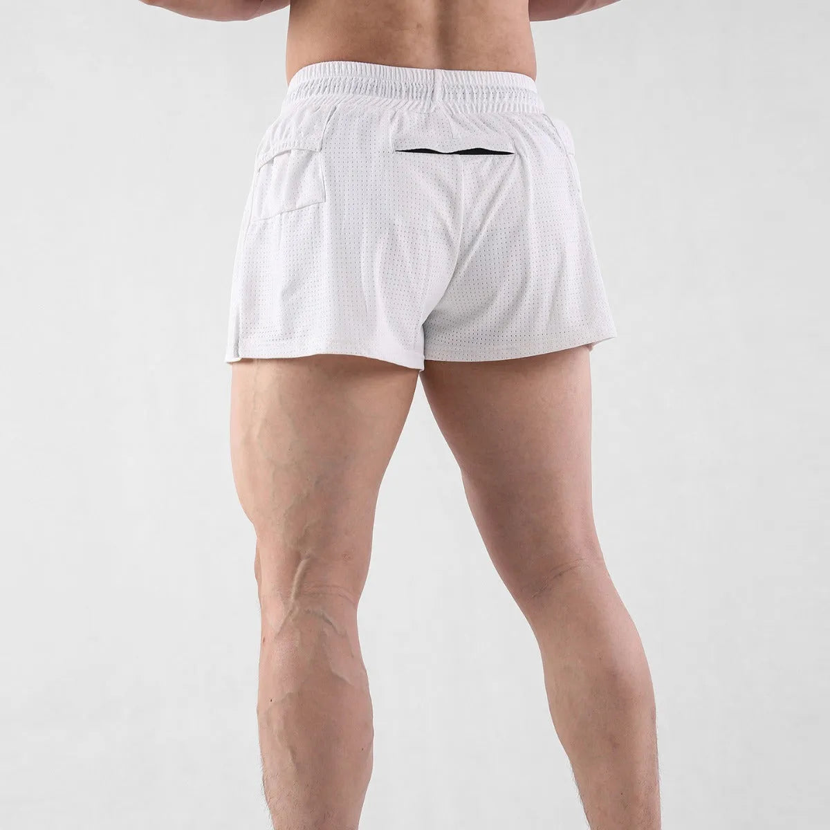 Men's quick-drying nylon shorts in black and white colours with mid waist fit