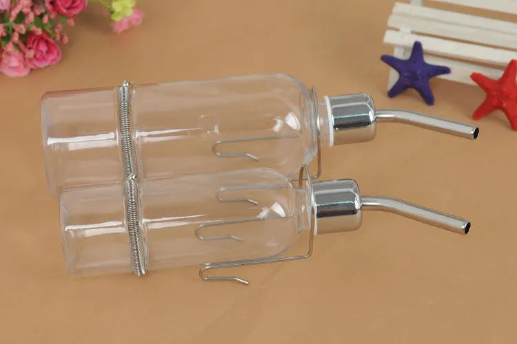 Transparent hanging water feeder bottle for small pets with stainless steel faucet, 180ml and 350ml capacities