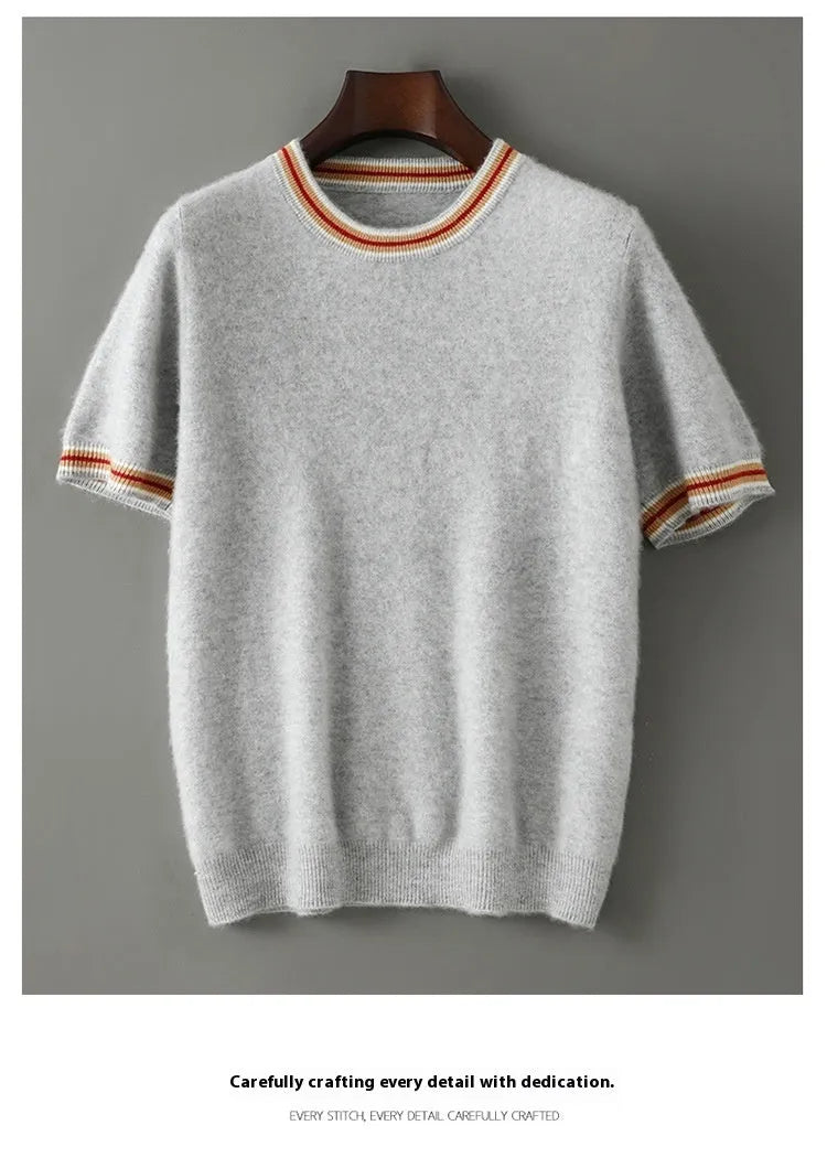 Men's grey short sleeve wool sweater with a round neck, laid flat