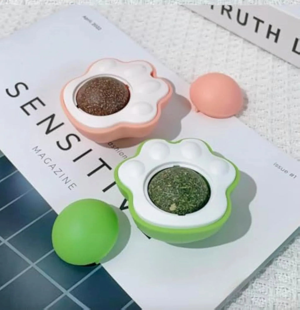 Edible catnip dental chew balls in blue, green, and pink colours measuring 45x33x50mm