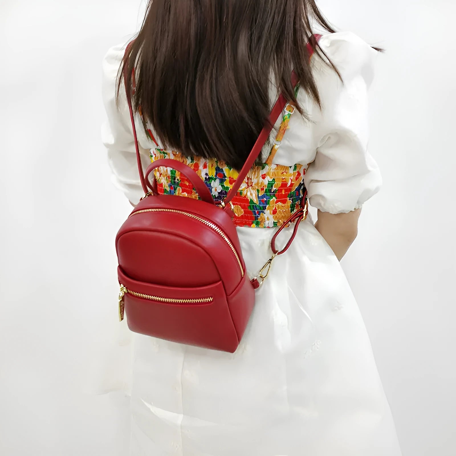 Soft PU mini backpack in street style with 3D pocket, shown in one of six available colours.