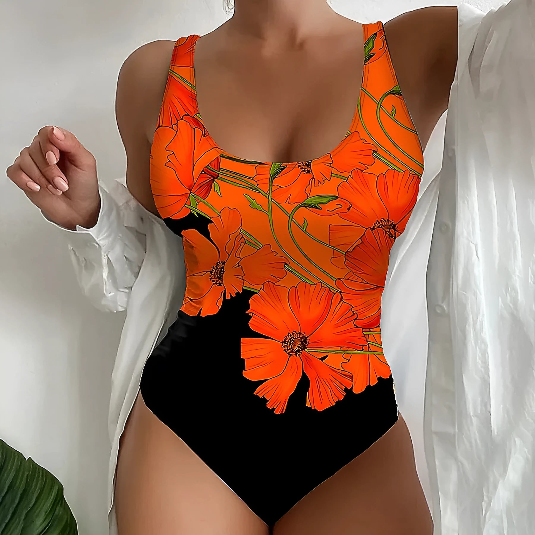 Orange flowers printed one-piece swimsuit with a backless design and slim fit.