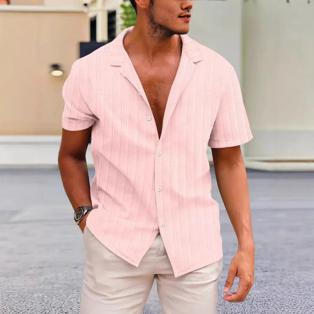 Men's short sleeve cardigan shirt in polyester corduroy, shown in apricot colour with button front.