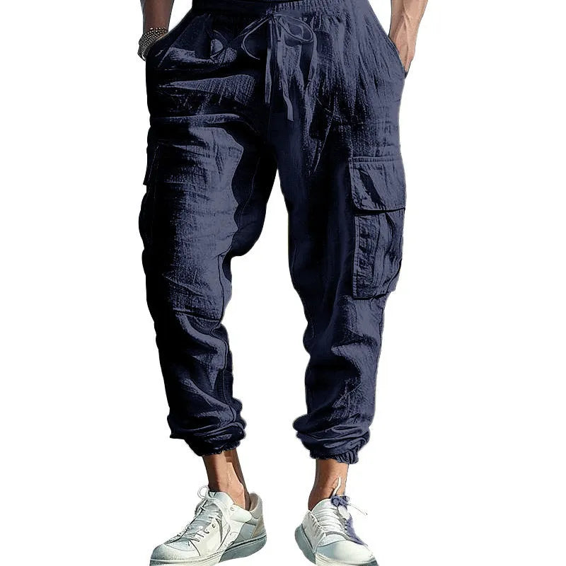 Men's linen trousers with ankle ties and multiple pockets in army green colour