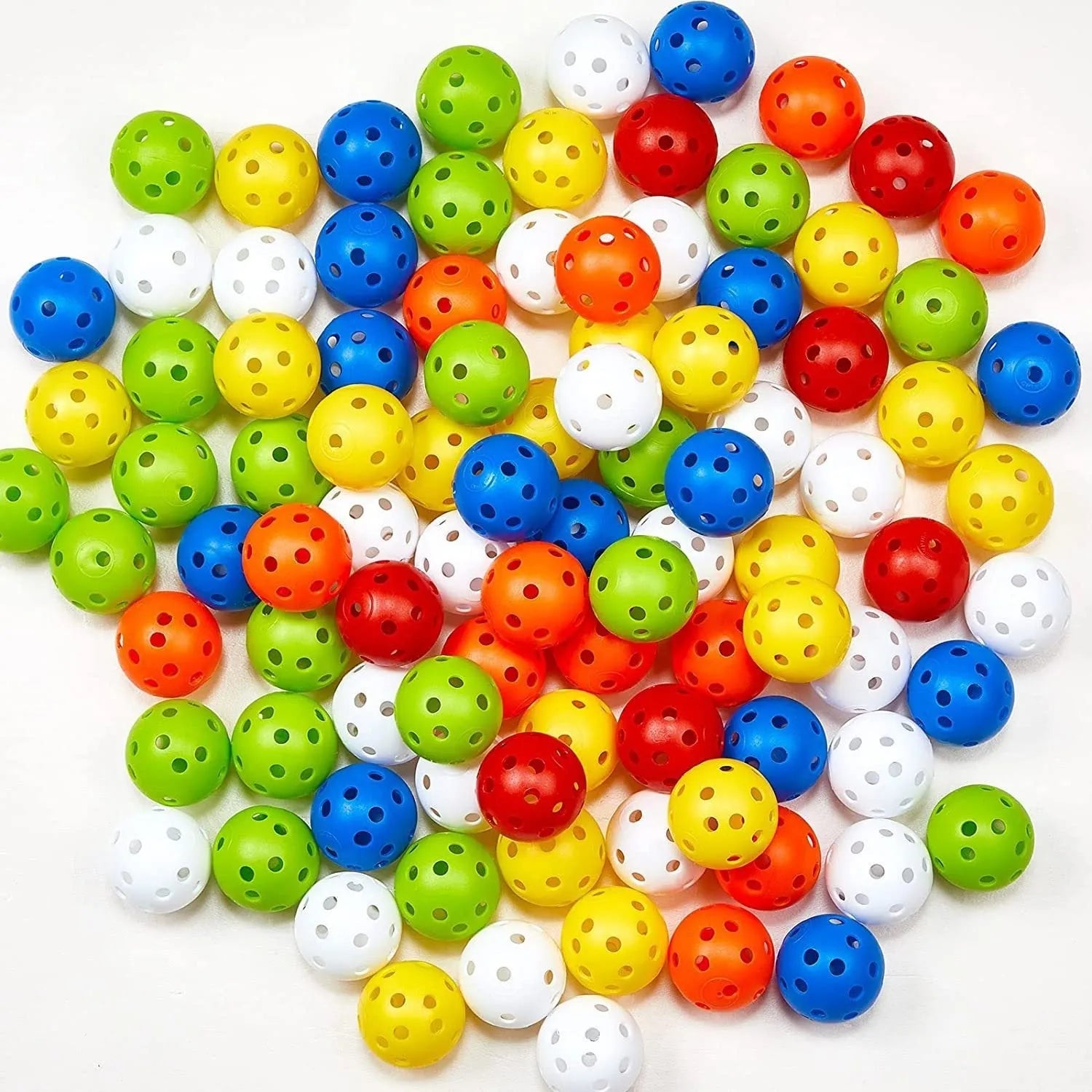 Multi-colour golf practice balls in red, orange, blue, green, white and yellow with net packaging