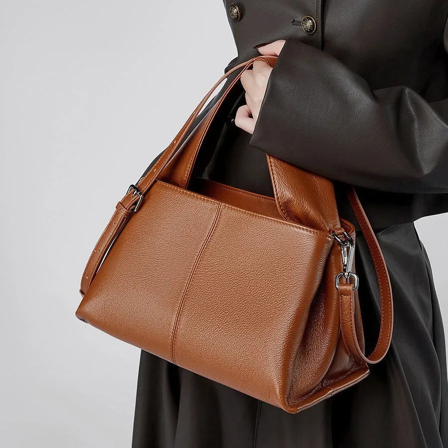 Women's genuine cowhide messenger bag in horizontal square shape with double shoulder straps