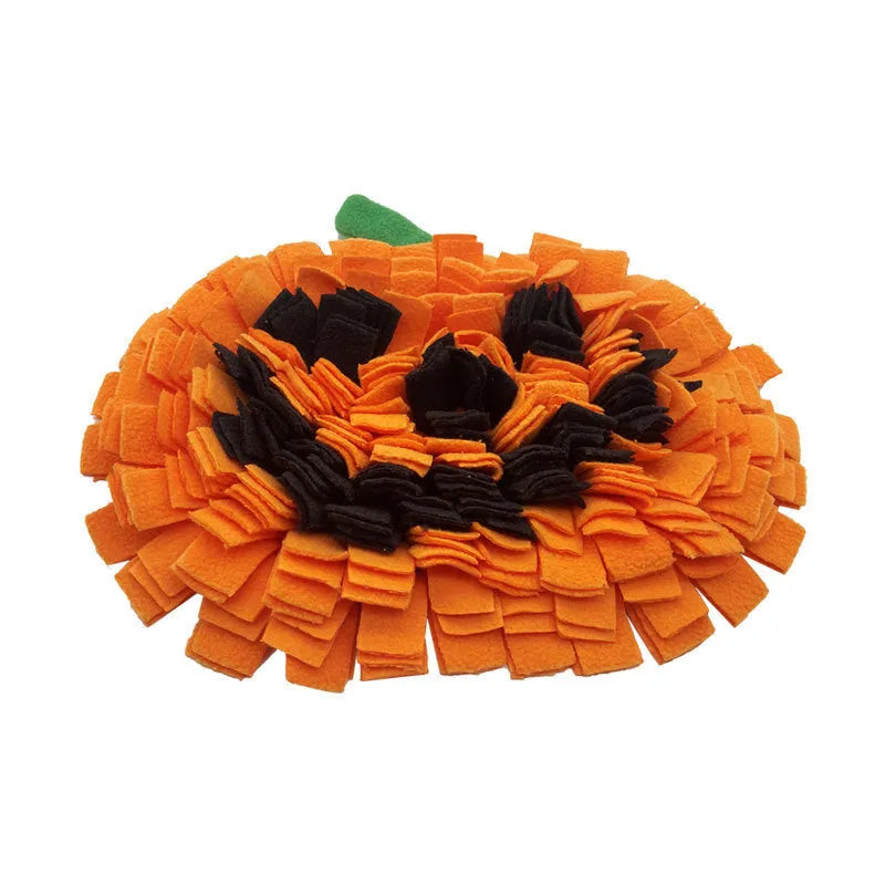 Orange pumpkin-shaped pet slow feeder snuffle mat with textured polar fleece channels