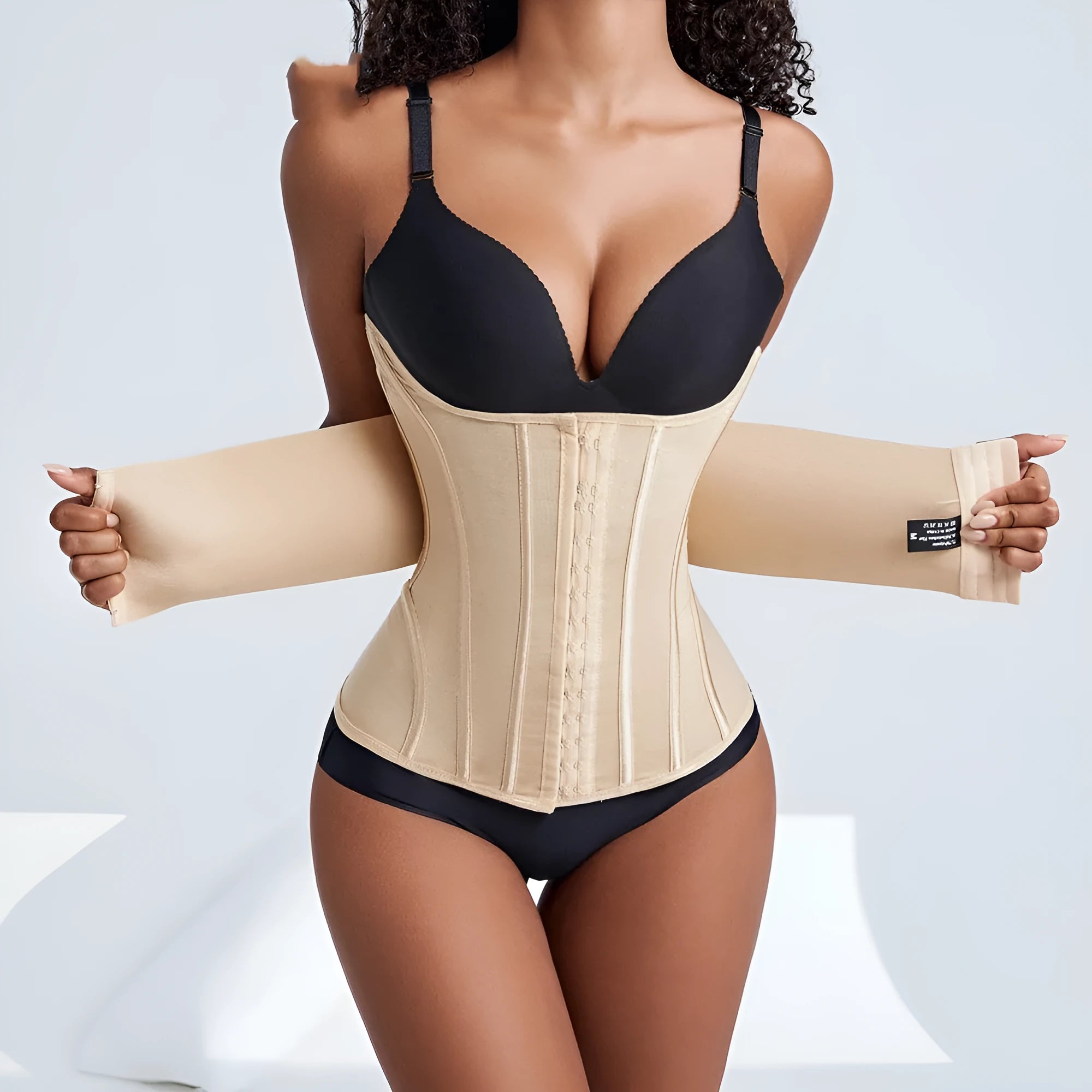 Nylon waist training belly band in black or apricot colour with adjustable tie.