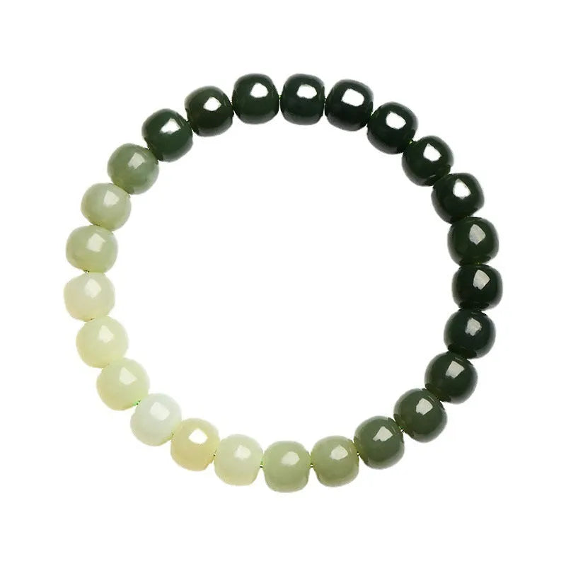 Natural Hetian jade bracelet showing a sunny water gradient colour on polished beads.