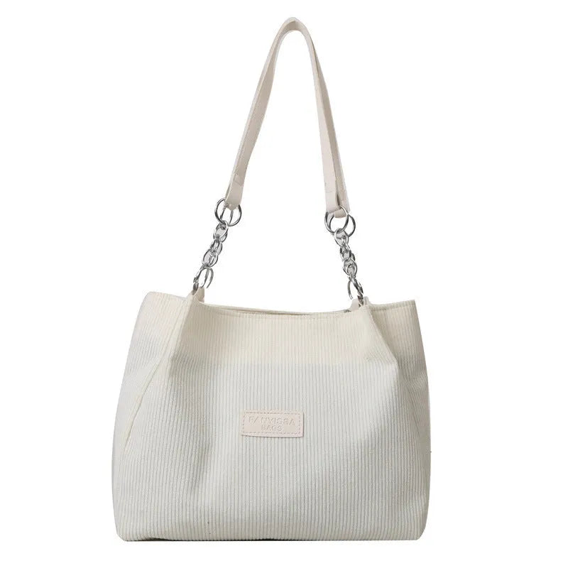 Corduroy tote bag with three-dimensional pockets in black colour option