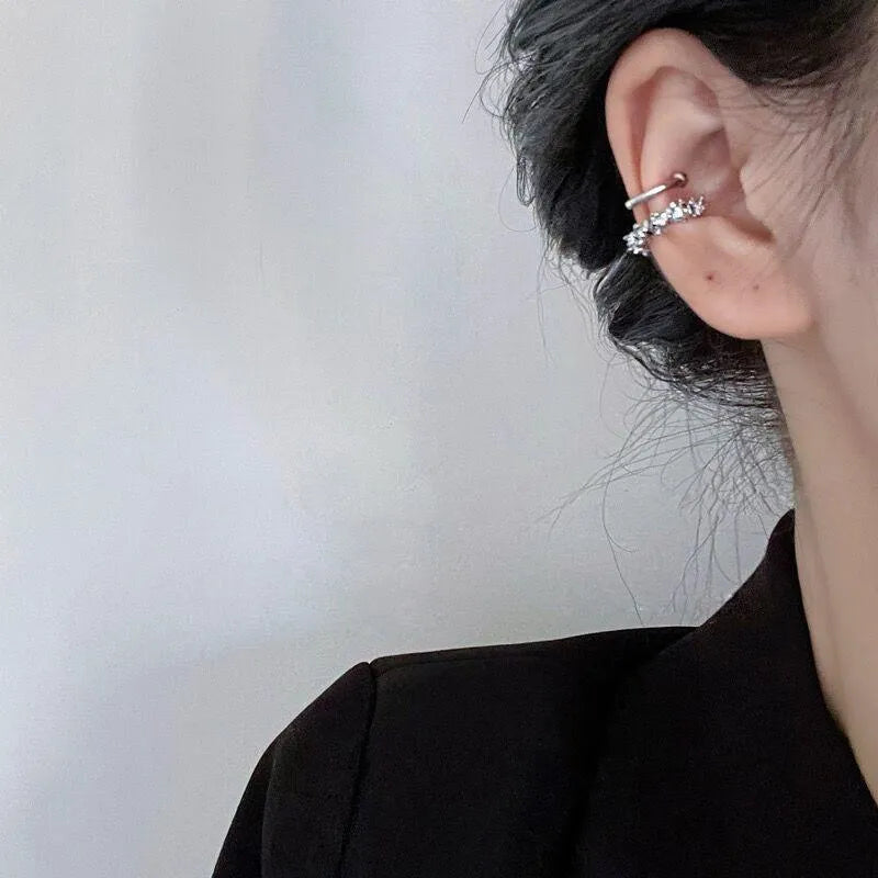 A pair of geometric irregular-shaped alloy earrings with a frosty finish and clip-on fastenings.