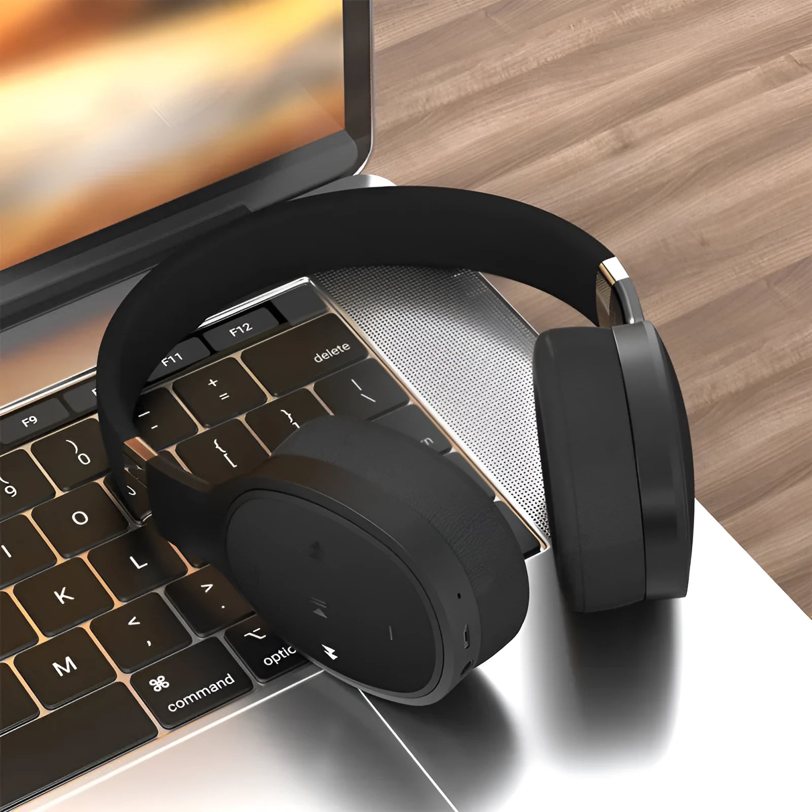 Foldable wireless Bluetooth sports headphones in black showing collapsed design.