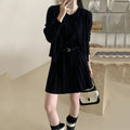 Women's grey knitted national style two-piece set with cardigan, pleated vest skirt, and belt.