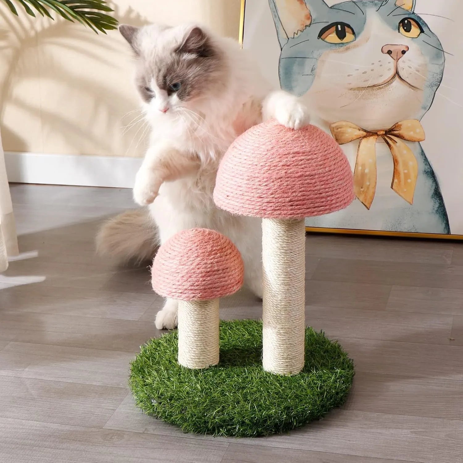 Pink mushroom-shaped cat scratching post with natural sisal caps and pole on a sturdy base.