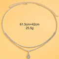 Gold waist chain with rhinestone decoration and lobster buckle clasp measuring 105cm length
