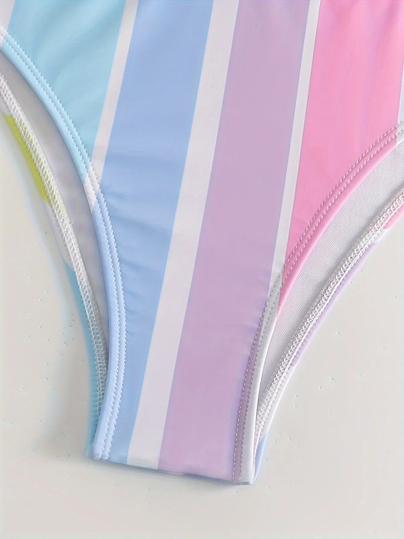 Women's striped sports bikini set with briefs bottom, shown in picture colour.