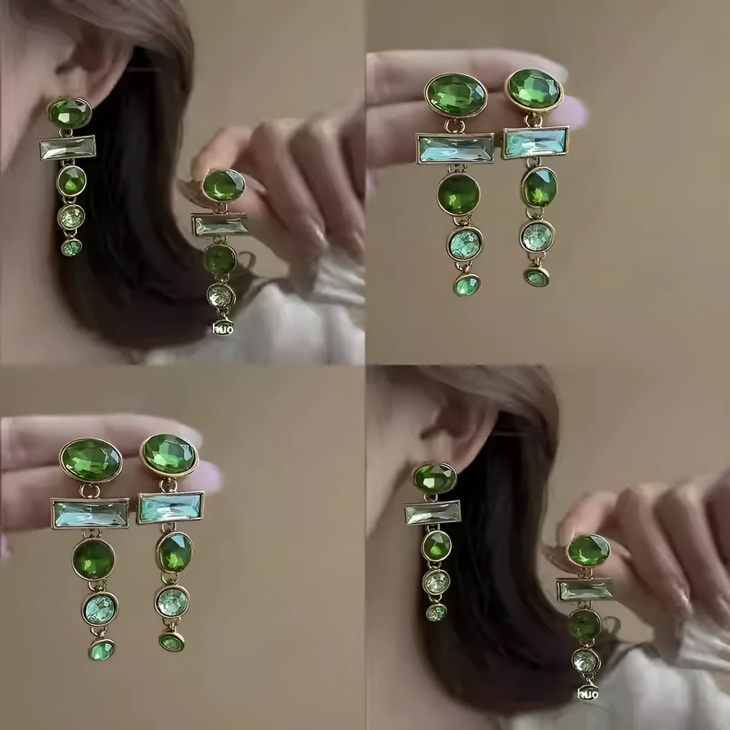 A pair of green gradient geometric alloy earrings with a tassel and inlaid zircon stones in a Chinese retro style.