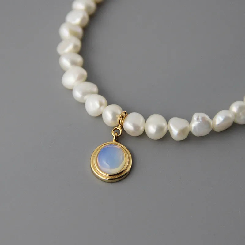 Geometric silver pendant pearl necklace with irregular pearls on adjustable silver chain
