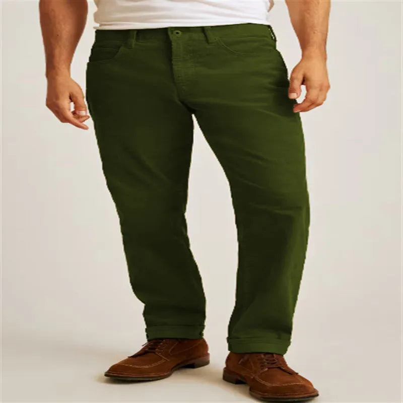 Straight-leg corduroy trousers in green colour with mid-waist styling and zip fly opening