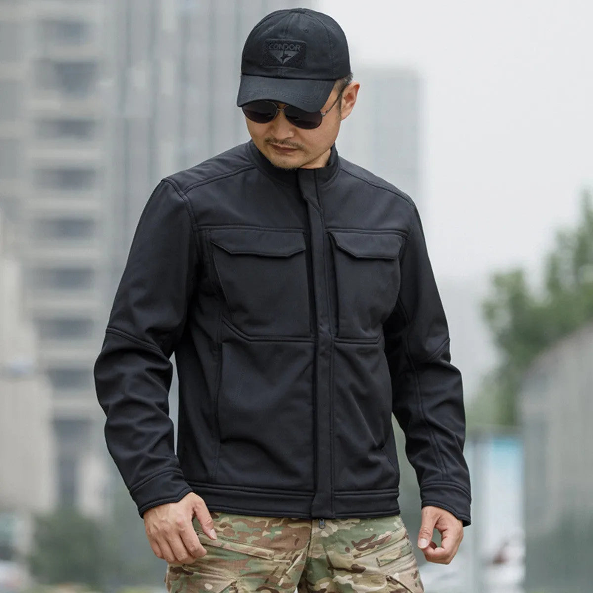 Black tactical soft shell mountaineering jacket for outdoor camping and winter sports