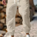Men's straight-leg linen trousers with elastic waistband in army green colour
