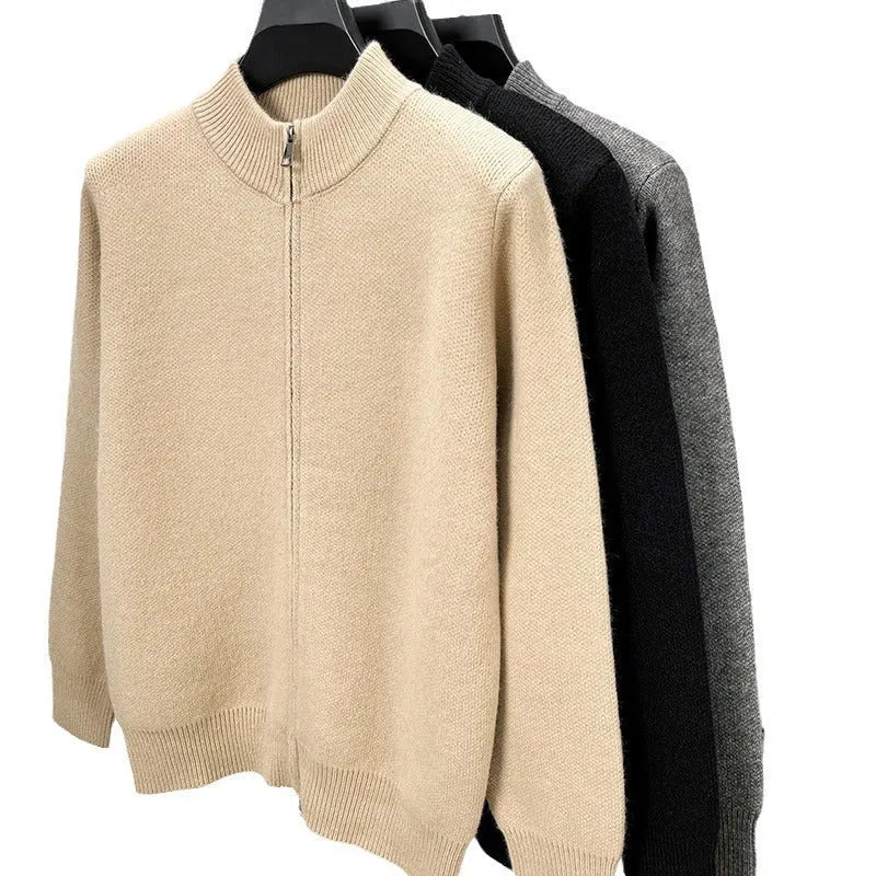 Men's black knitted zip-up cardigan with a stand collar and loose fit.
