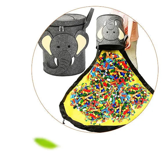 Green felt cube storage bag with pull rope closure, shown open flat as a play mat.