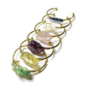 Natural crystal rough stone bracelet with gold metal winding in a geometric bohemian design