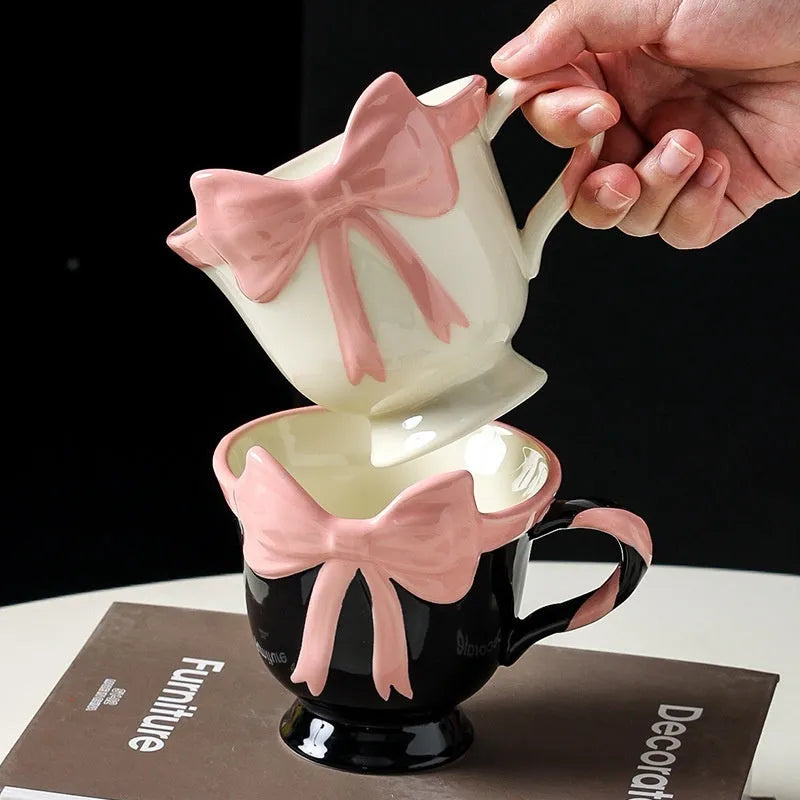 Ceramic mug with girl heart bow design in black pink or white powder colour, 301-400ml capacity