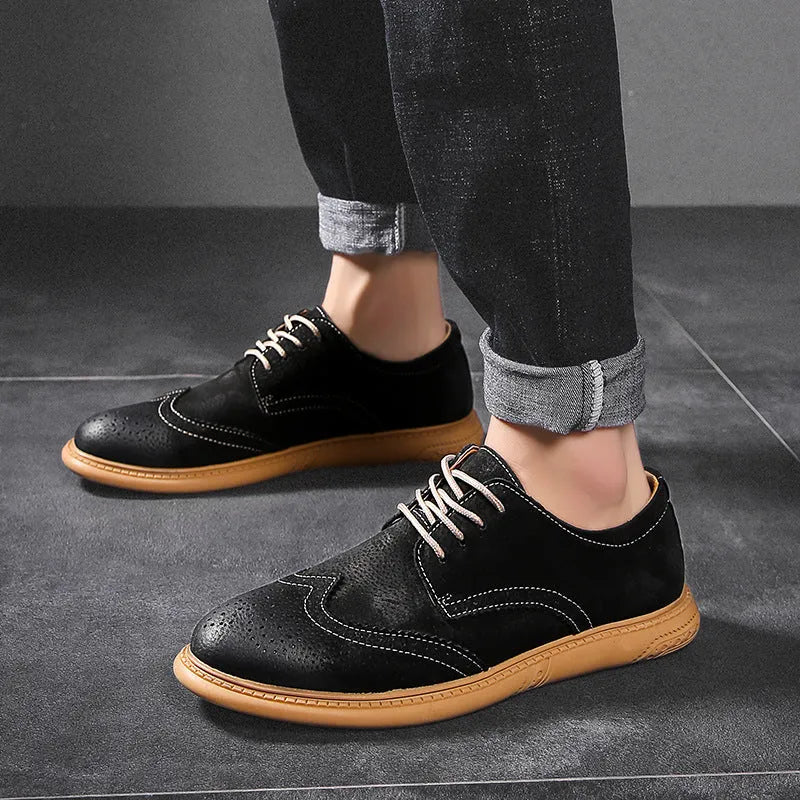 Men's black low-top leather lace-up business shoes with stitching detail on a white background.
