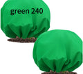 Round green non-woven plant frost cover with drawstring resting on grass, showing 1.9m diameter size