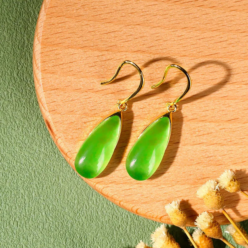 Chinese style geometric earrings with water droplet design in jade colour on copper base