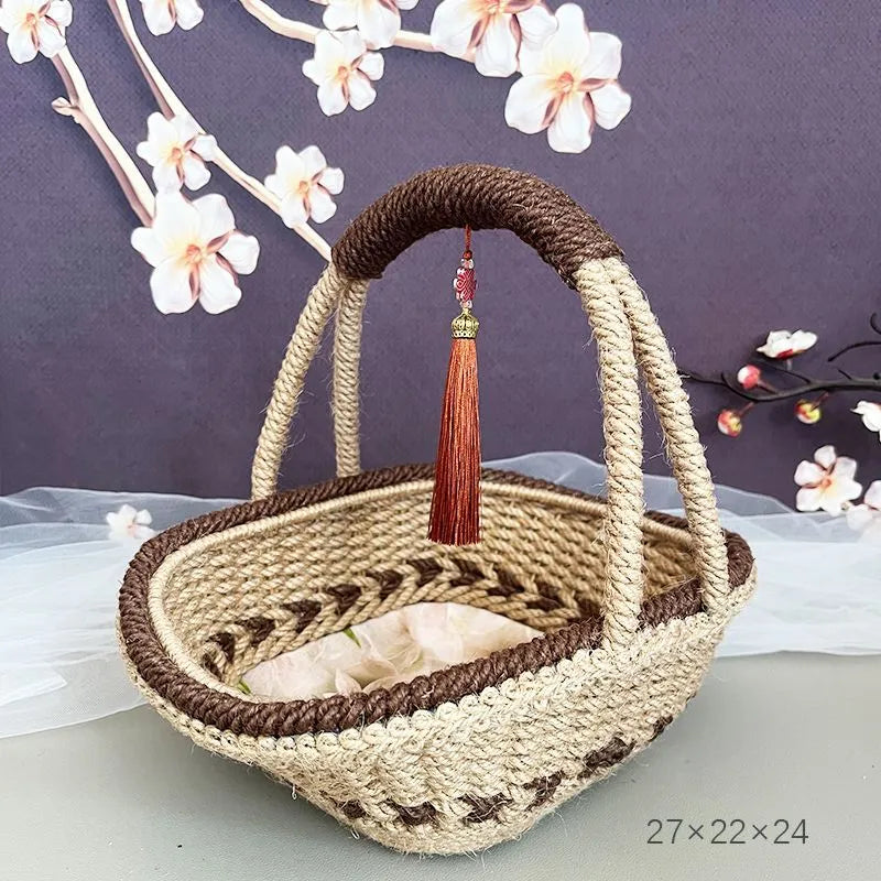 Hand-woven straw basket with hemp rope detailing in coffee brown colour