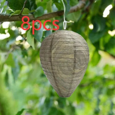 Hexagonal paper beehive lantern with wire frame measuring 22x28cm in photo colour
