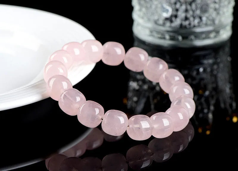 Pink natural bamboo crystal bracelet with 11x12mm barrel beads and geometry design
