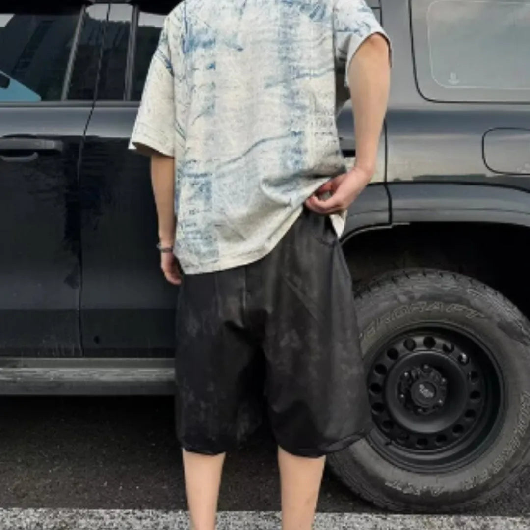 Solid colour oversized short sleeve T-shirt on a hanger, loose fit round neck.
