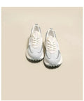 Women's grey and pink retro sneaker with low-top design and round toe