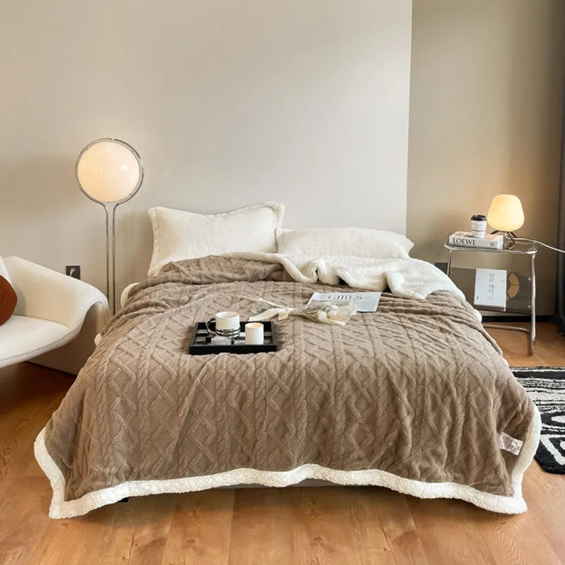 Polyester thermal flannel blanket in tea green colour on a bed, showing modern simplicity design.