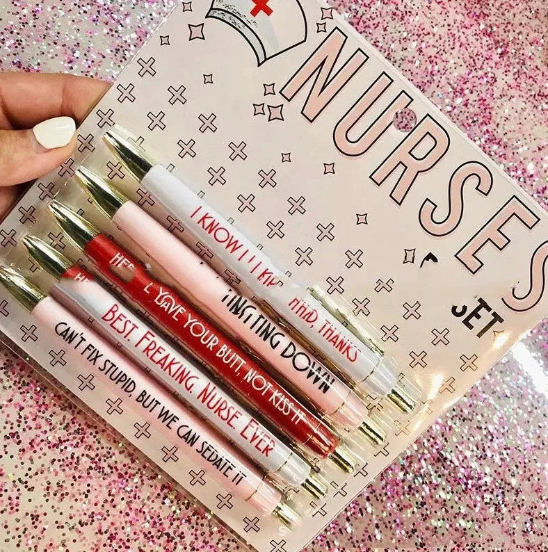 Five nurse theme ballpoint pens with retractable mechanisms and medical humour text