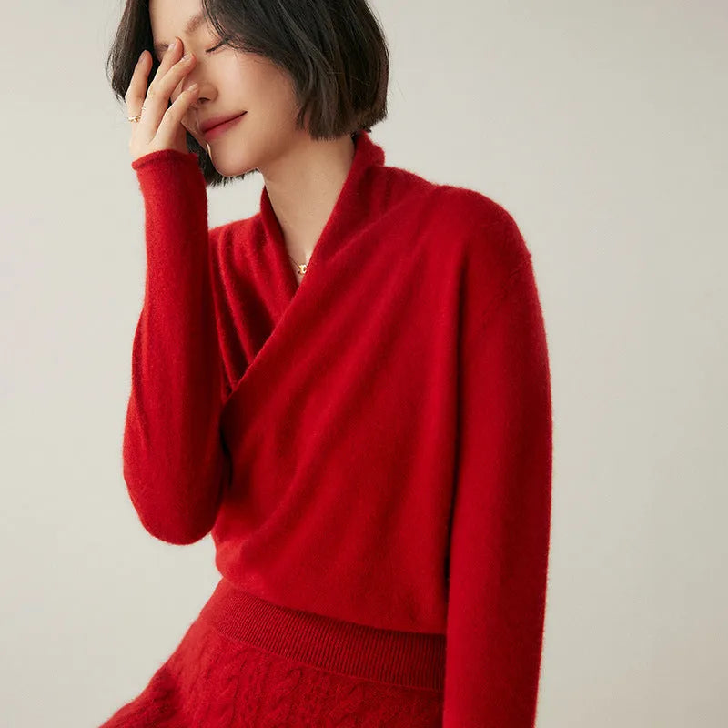 Women's solid colour cashmere V-neck cross sweater top with long sleeves in Elegant Camel, shown on a model.