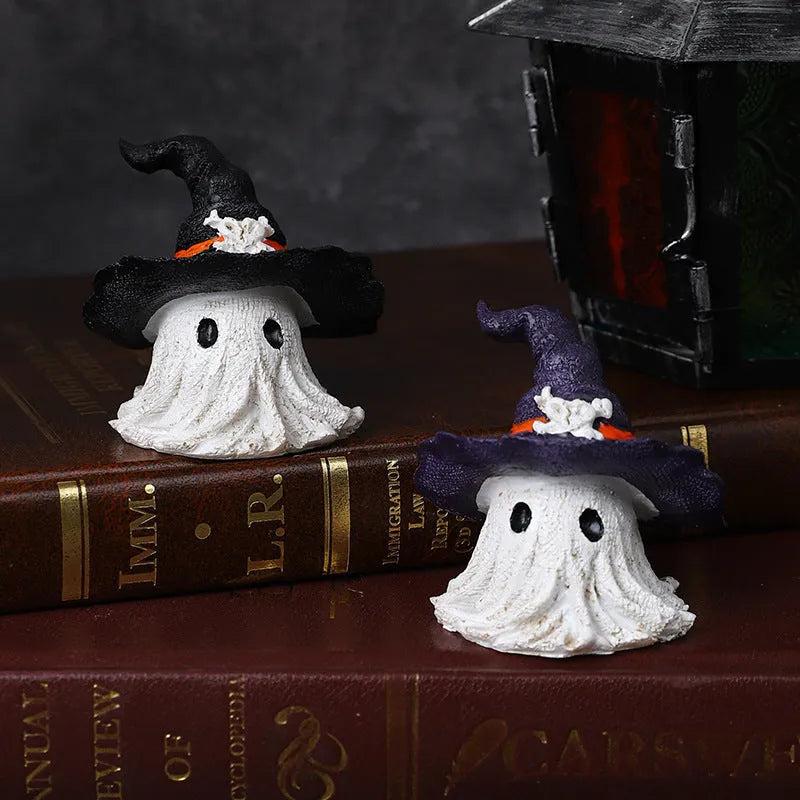Small resin wizard hat ghost ornament in black or purple for holiday decoration.