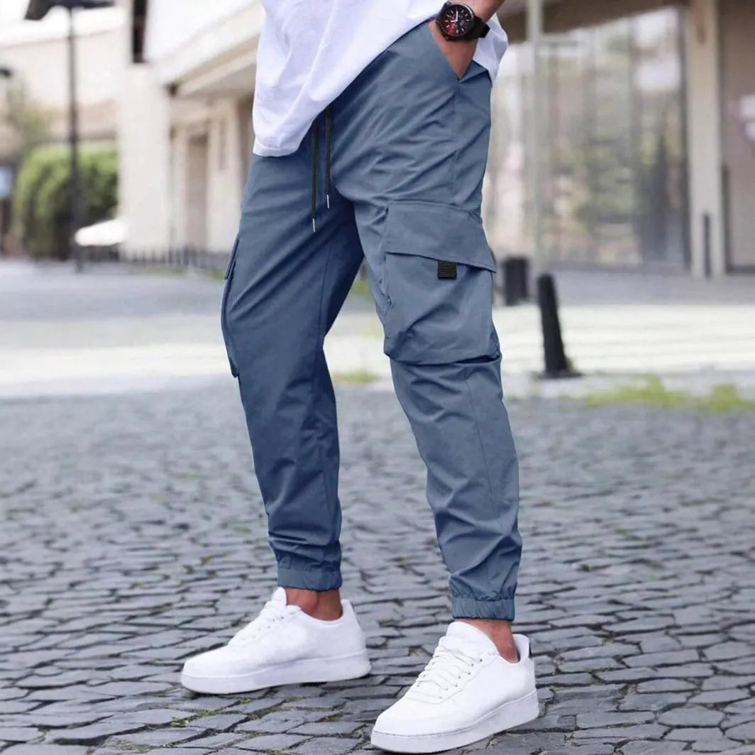 Solid colour polyester fibre workwear casual track pants with drawstring elastic waist, available in multiple colours