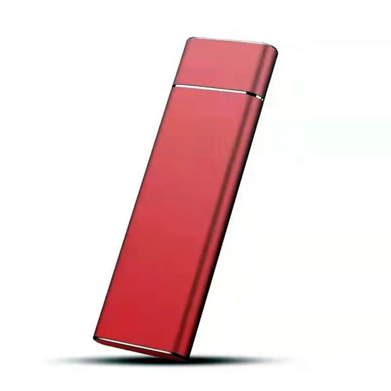 Silver ultra-thin metal SSD mobile hard disk with data cable on a desk