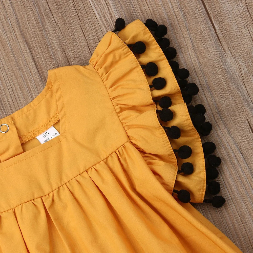 Sleeveless orange girls dress for children ages 3 months to 14 years, sizes 12M to 5T