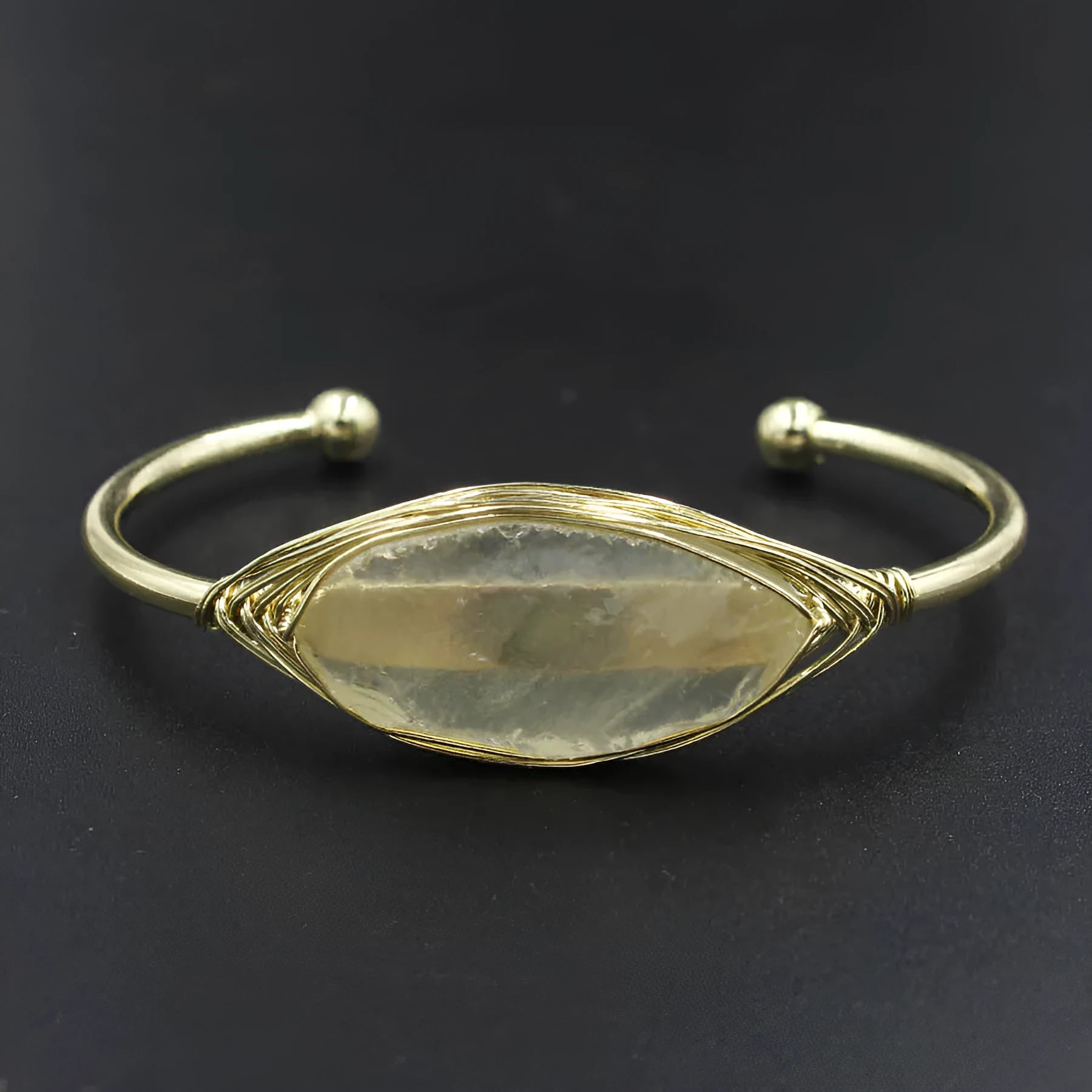 Raw gemstone bracelet with rough 8mm crystal beads in amorphous shapes on wrist, showing unisex ethnic style.