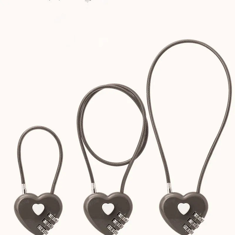 Peach heart shaped wire rope lock in various colours with different steel cable lengths for securing bicycle helmets