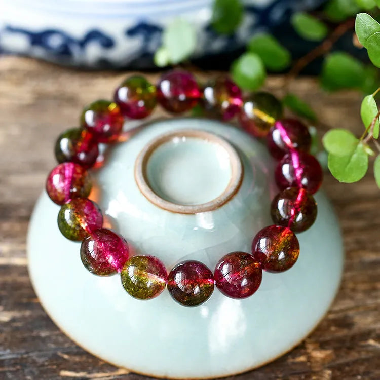 Women's watermelon crystal bracelet showing handmade construction with casual pastoral style