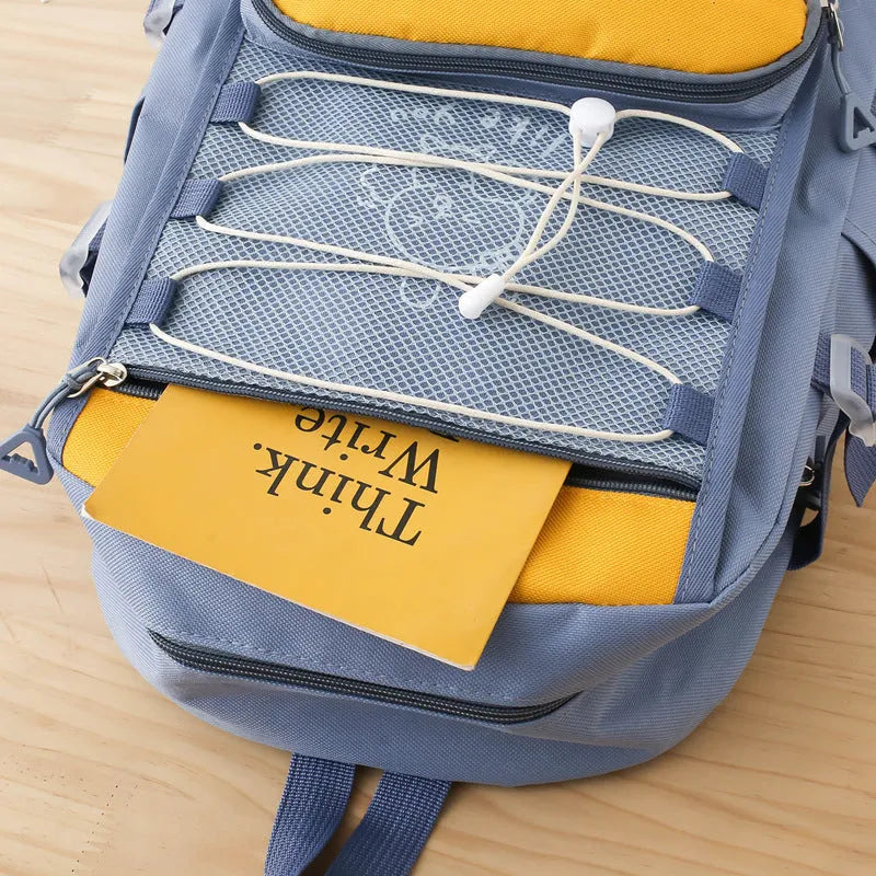Lightweight large capacity nylon student backpack set junior high school breathable wear-resistant anti-seismic curved shoulder strap